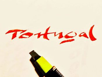 Close-up of red balloons on white background