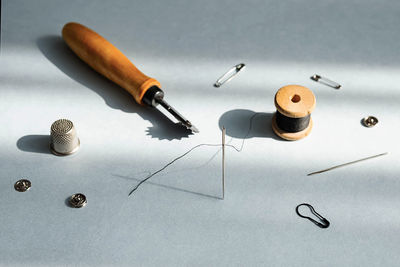 Stitching tools. various tailoring instruments. needlework hobby concept.