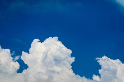 Low angle view of clouds in blue sky