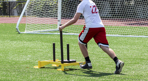 Man playing soccer on field