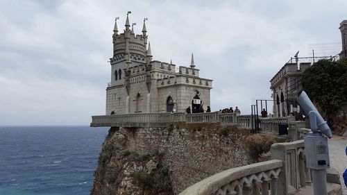View of historical building against cloudy sky
