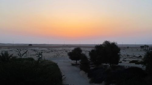 Scenic view of silhouette landscape against sky during sunset