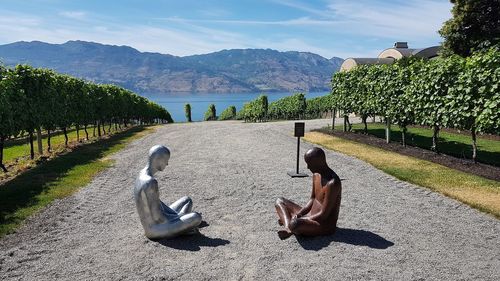 High angle view of man on lake against sky