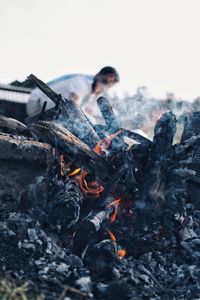 High angle view of bonfire on wood