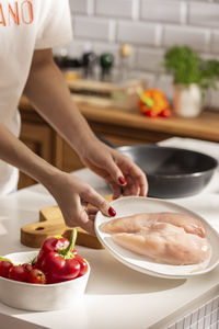 Cooking dinner with chicken and vegetables