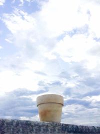 Close-up of stone wall against sky