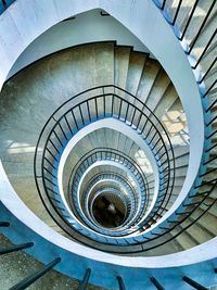 Directly below shot of spiral staircase in building
