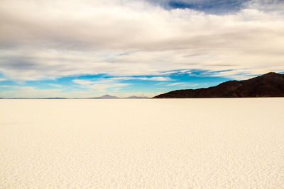 Scenic view of desert against sky