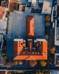 High angle view of buildings by street in city