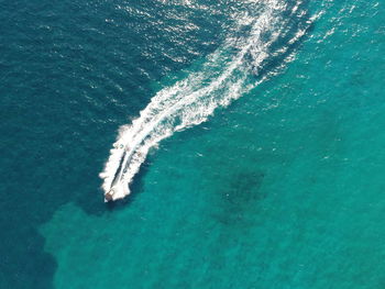 High angle view of boat sailing on sea