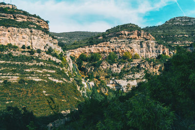 Panoramic view of landscape and mountains against sky