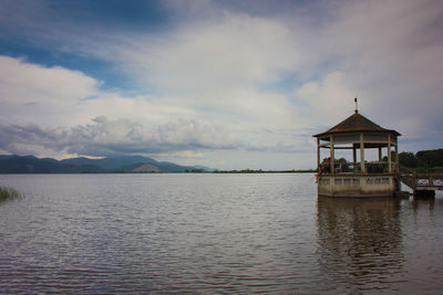 Wooden gazebo on stilts in torre del lago in versilia landscape