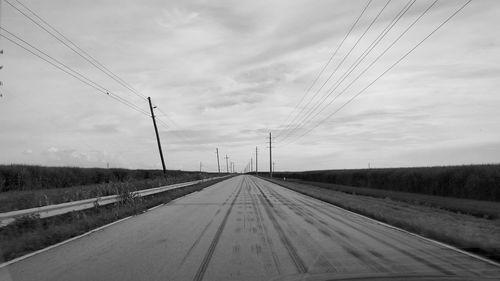 Road passing through field