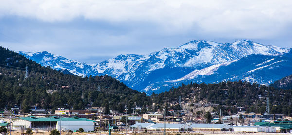 Scenic view of mountains against sky during winter