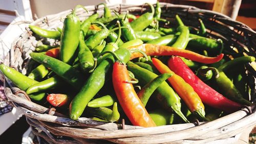 Close-up of chili peppers in basket