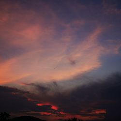 Low angle view of dramatic sky during sunset