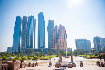 Modern buildings in city against sky