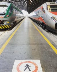 Trains at railroad station platform