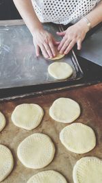 Midsection of woman preparing food