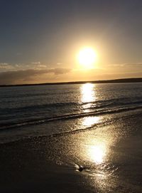 Scenic view of sea at sunset