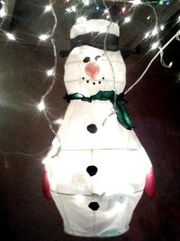 Close-up of white stuffed toy on white wall