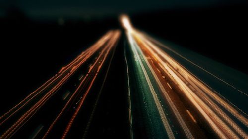 Light trails on road at night