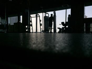 Silhouette people standing in office