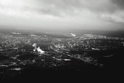 Aerial view of cityscape against sky