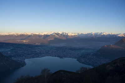 Scenic view of mountains against clear blue sky