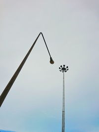 Low angle view of floodlight against sky