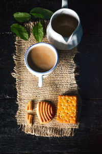 High angle view of coffee cup on table