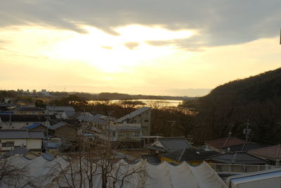 High angle view of townscape against sky at sunset