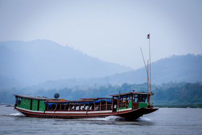 Boat in sea against sky