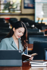 Businesswoman using digital tablet