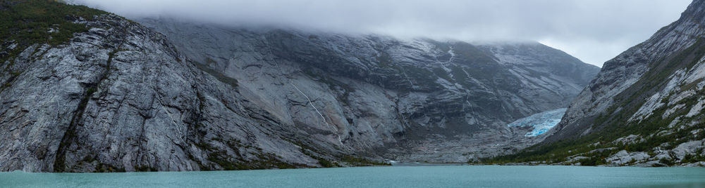 Scenic view of lake and mountains against sky, nigardsbrevatnet, nigardsbreen glacier, norway