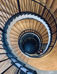 Directly below shot of spiral staircase of building