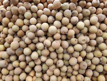 A collection of fresh longan fruit at the super market