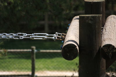 Close-up of ropes on wooden post