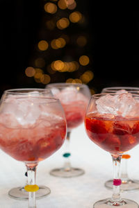 Close-up of gin glasses on table