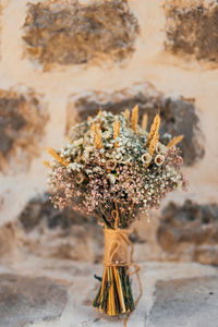 Close-up of dry flowers on table