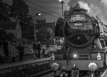 Train on railroad tracks against sky