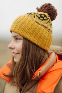 Portrait of young woman smiling outdoors