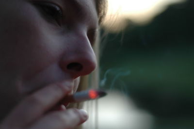 Young woman holding camera
