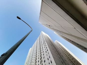 Low angle view of modern apartment buildings against sky