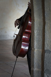 Close-up of guitar on wall