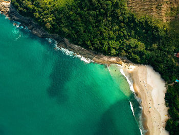 High angle view of surf on shore