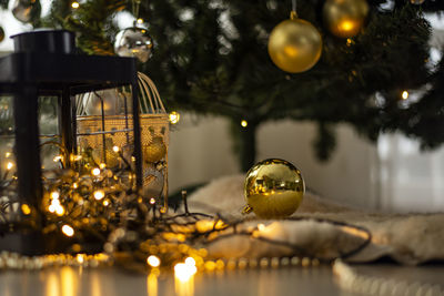 Close-up of illuminated christmas lights on tree