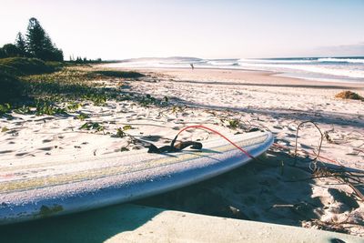 Scenic view of beach against clear sky