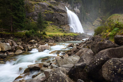 Scenic view of waterfall in forest