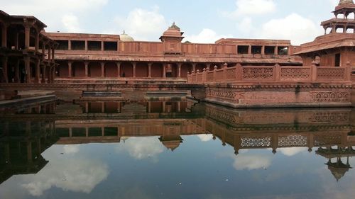Reflection of fort on pond